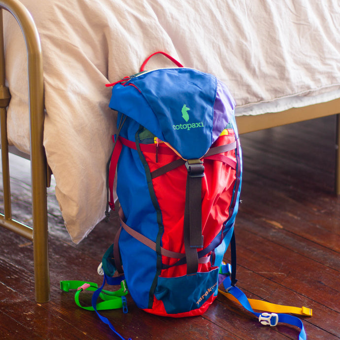 Cotopaxi Tarak 20L backpack in Del Dia colorway perfect for camping and available at AJ Vagabonds in Dallas, Texas